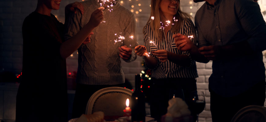 Group,Of,Smiling,Friend,Having,Fun,With,Sparkles,At,Home